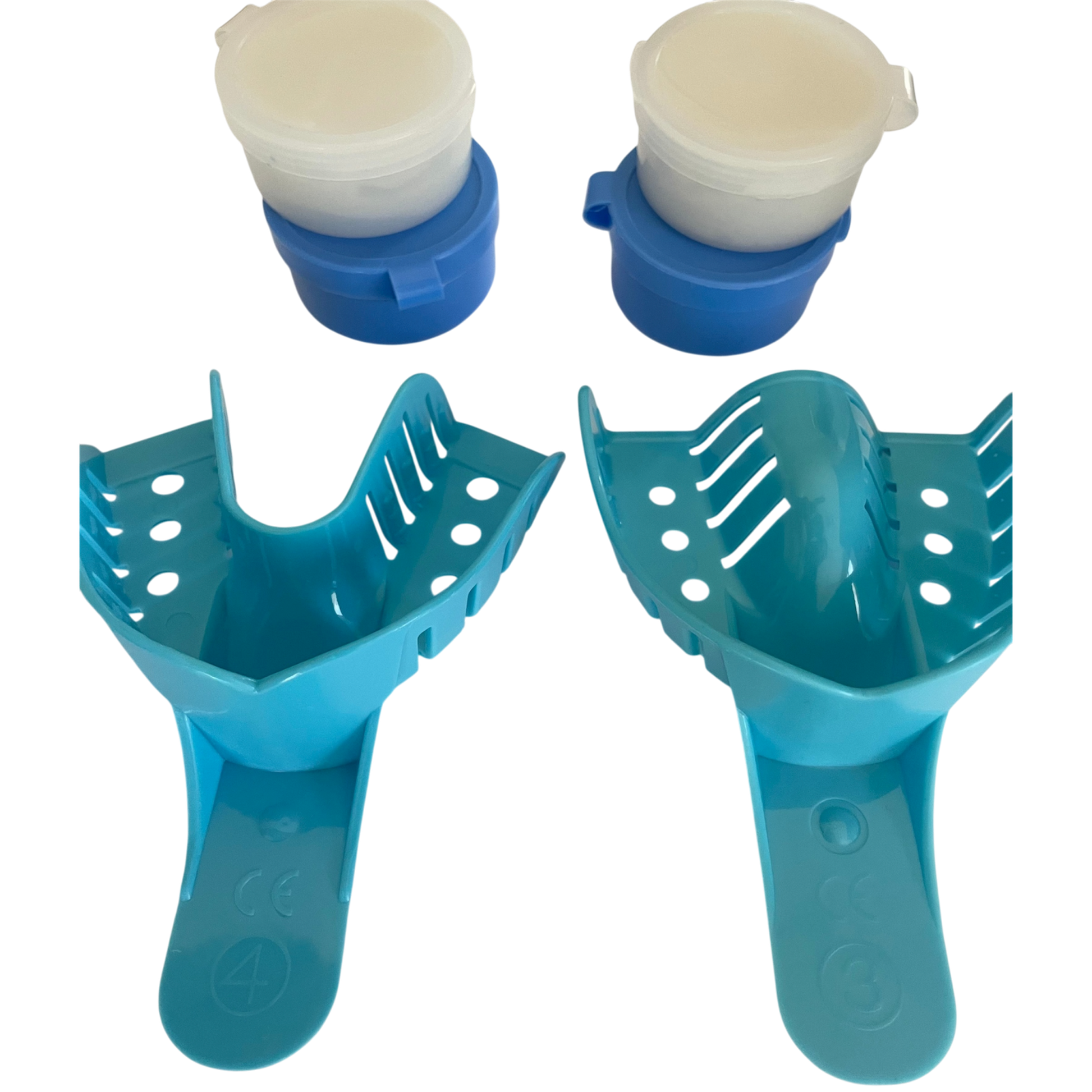 Two blue plastic trays with white dental on a white background